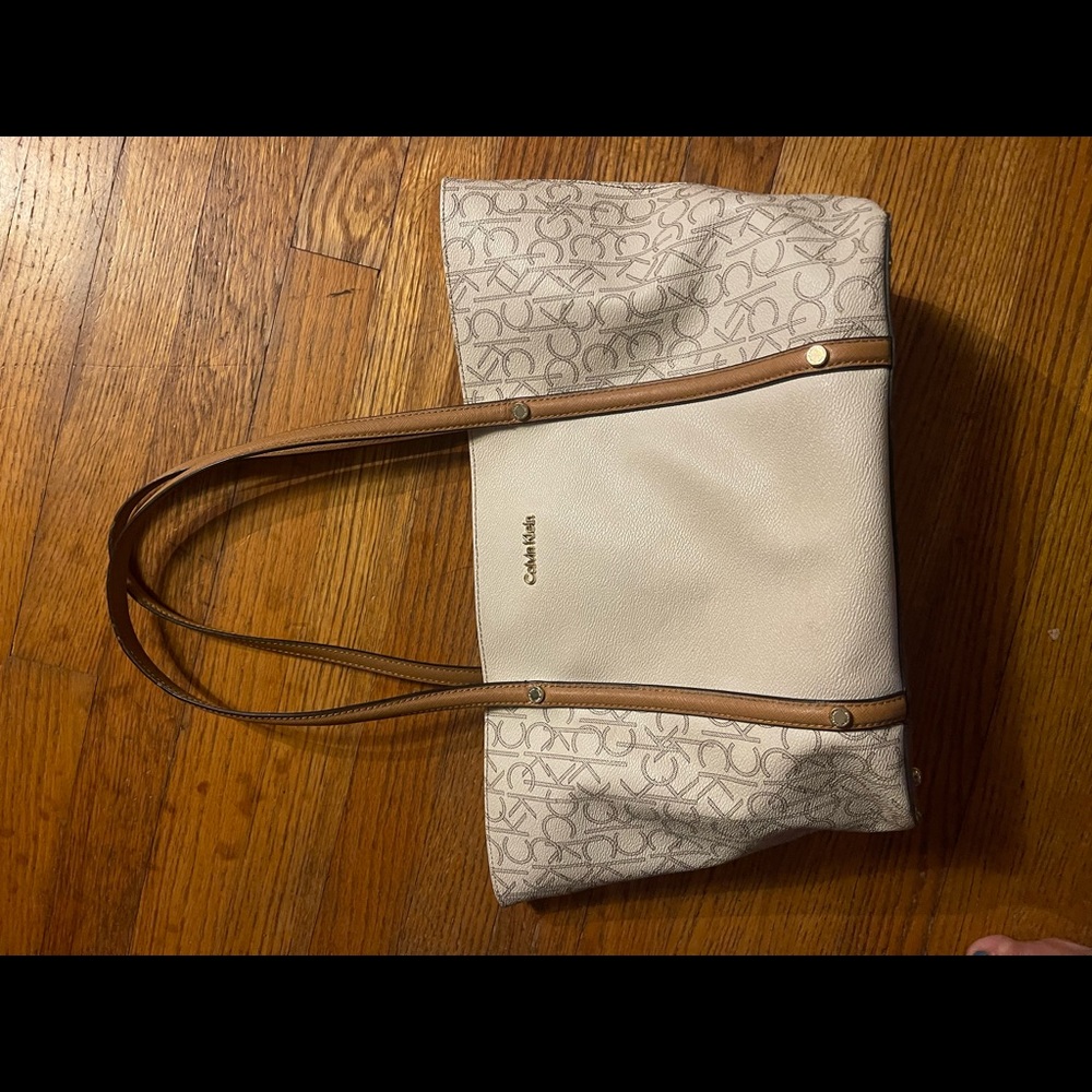 White Calvin Klein tote.